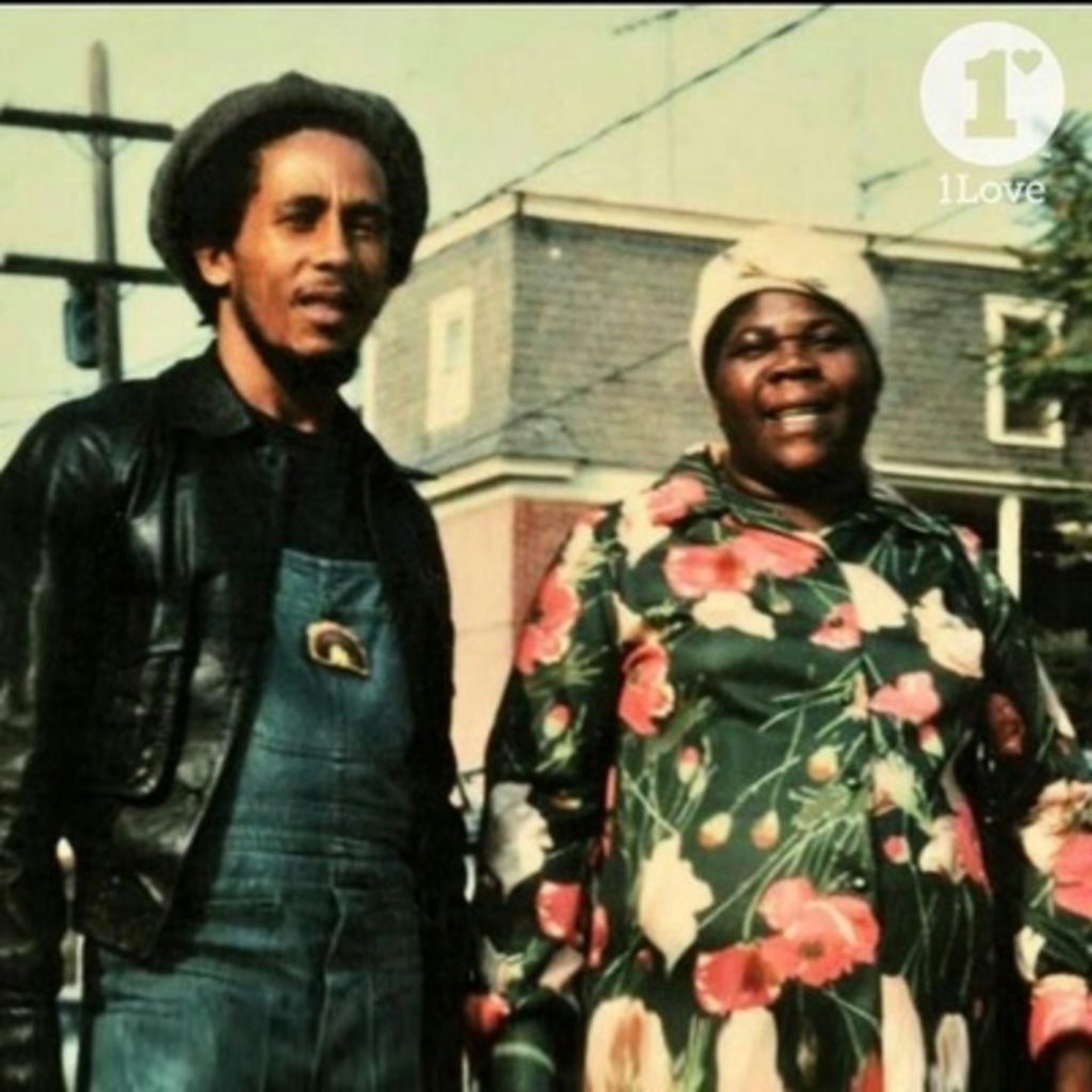 Bob Marley and his mother, Cedella Booker. Bob worked the "Night Shift" at Chrysler Corporation for a short period while living with his mom in Delaware, USA at various intervals between 1965 and 1977.