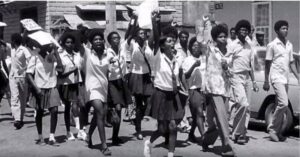 All of the students in the form five class of Woodbrook Secondary School were suspended in 1970