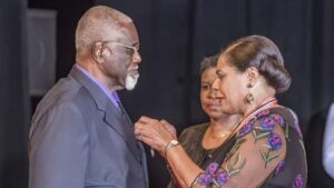 Professor Gordon Rohlehr receiving Trinidad and Tobago's Silver Chaconia Medal in 2022 from President Paula Mae Weekes at the National Awards. Photo: Office of the President.